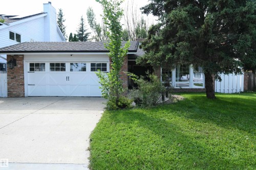 Mere steps to the Lessard Community League playground, and 1 block to the river valley, this 1800+ bungalow with a stunning open layout and huge kitchen with a 13 foot island, is a rare opportunity - 572 Lessard Drive Nw, Edmonton, AB - Outdoor