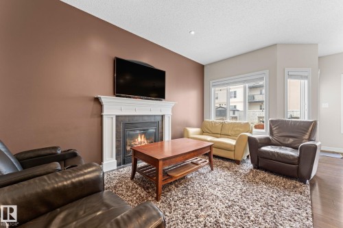45 Meadowview Court, Spruce Grove, AB - Indoor Photo Showing Living Room With Fireplace