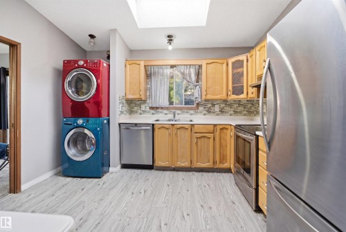 2107 40 Street Nw, Edmonton, AB - Indoor Photo Showing Kitchen With Stainless Steel Kitchen With Double Sink