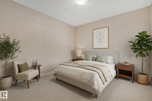 Neutral-toned room featuring light-colored walls and wall-to-wall carpeting - #120 8931 156 St Nw, Edmonton, AB - Indoor Photo Showing Bedroom