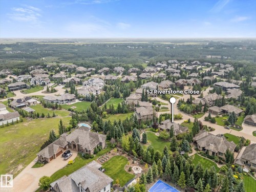 Expansive residential development featuring mature landscaping and a variety of architectural styles - #52 Riverstone Close, Rural Sturgeon County, AB - Outdoor With View