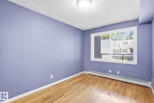 #15 11008 124 St Nw, Edmonton, AB - Indoor Photo Showing Other Room