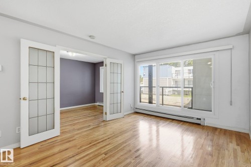 #15 11008 124 St Nw, Edmonton, AB - Indoor Photo Showing Other Room
