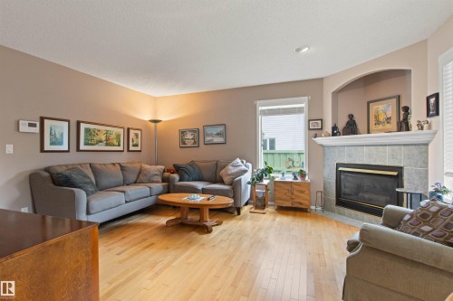 627 Wotherspoon Close Nw, Edmonton, AB - Indoor Photo Showing Living Room With Fireplace