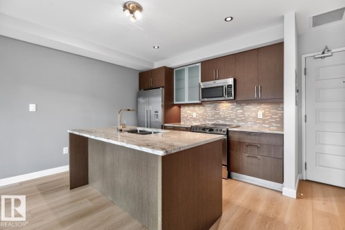 #405 10388 105 St Nw, Edmonton, AB - Indoor Photo Showing Kitchen With Upgraded Kitchen