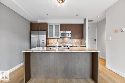 #405 10388 105 St Nw, Edmonton, AB - Indoor Photo Showing Kitchen With Upgraded Kitchen