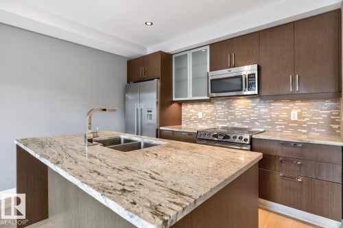 #405 10388 105 St Nw, Edmonton, AB - Indoor Photo Showing Kitchen With Double Sink With Upgraded Kitchen