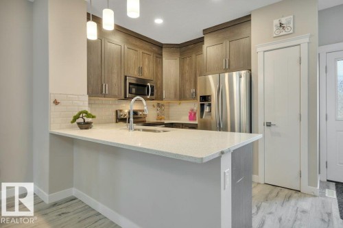 729 Berg Loop, Leduc, AB - Indoor Photo Showing Kitchen With Double Sink