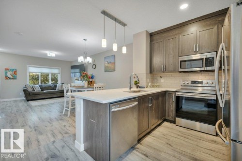 729 Berg Loop, Leduc, AB - Indoor Photo Showing Kitchen With Upgraded Kitchen