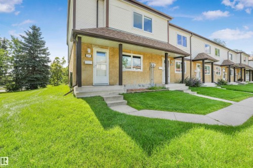 Two-story townhome with a stucco and siding exterior - #39 14511 52 Street Nw, Edmonton, AB - Outdoor