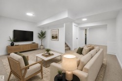 Recessed lighting and a wall-mounted television over a wood-finish media console create a contemporary entertainment space - 