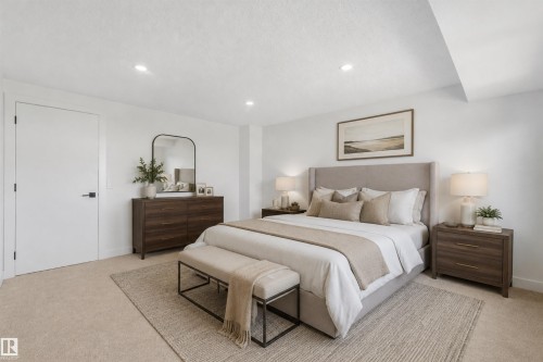 Recessed lighting, light-toned carpeting, and a white door with contemporary hardware - #39 14511 52 Street Nw, Edmonton, AB 