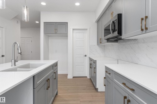 913 19 Avenue Nw, Edmonton, AB - Indoor Photo Showing Kitchen With Double Sink With Upgraded Kitchen