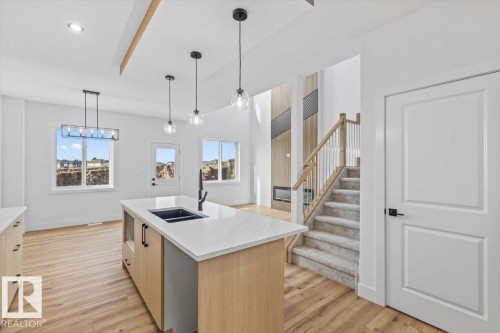 25 Foxtail Road, Fort Saskatchewan, AB - Indoor Photo Showing Kitchen With Double Sink