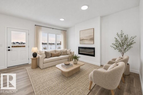 18931 28 Avenue Nw, Edmonton, AB - Indoor Photo Showing Living Room With Fireplace