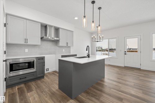 18931 28 Avenue Nw, Edmonton, AB - Indoor Photo Showing Kitchen With Upgraded Kitchen