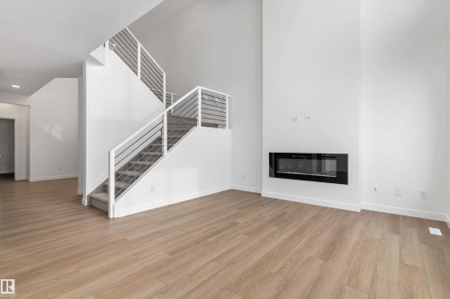 18927 28 Avenue Nw, Edmonton, AB - Indoor Photo Showing Other Room With Fireplace