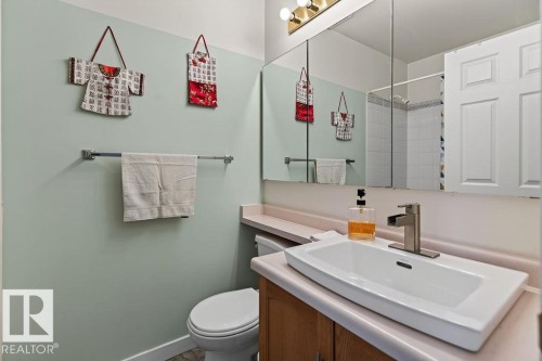 Bathroom featuring a rectangular vessel sink with a single-handle brushed nickel faucet - 1046 Jones Crescent Nw, Edmonton, AB - Indoor Photo Showing Bathroom