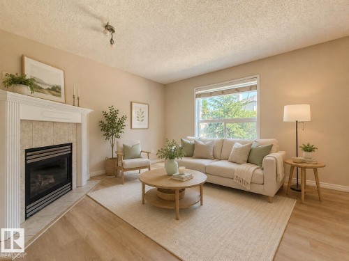 976 Rutherford Road Sw, Edmonton, AB - Indoor Photo Showing Living Room With Fireplace
