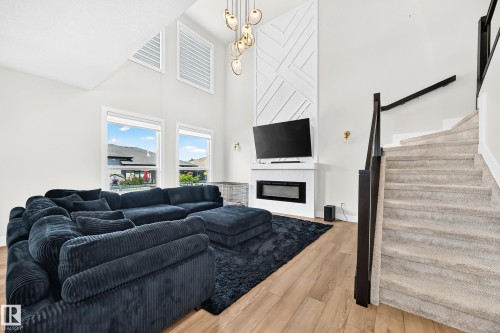 38 Avonlea Way, Spruce Grove, AB - Indoor Photo Showing Living Room With Fireplace