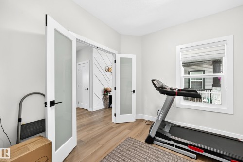 38 Avonlea Way, Spruce Grove, AB - Indoor Photo Showing Gym Room