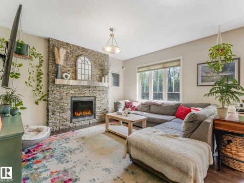 2825 Anderson Place Sw, Edmonton, AB - Indoor Photo Showing Living Room With Fireplace