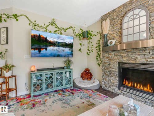 2825 Anderson Place Sw, Edmonton, AB - Indoor Photo Showing Living Room With Fireplace