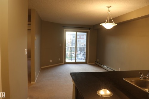 #312 3207 James Mowatt Trail Sw, Edmonton, AB - Indoor Photo Showing Other Room
