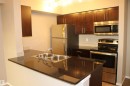 #312 3207 James Mowatt Trail Sw, Edmonton, AB  - Indoor Photo Showing Kitchen With Stainless Steel Kitchen With Double Sink 