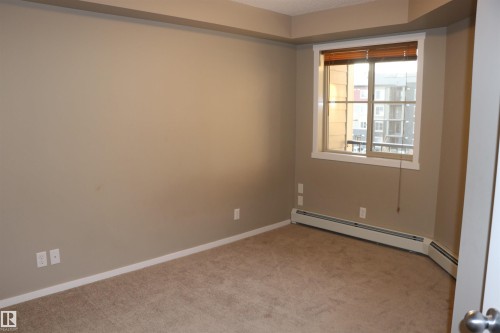#312 3207 James Mowatt Trail Sw, Edmonton, AB - Indoor Photo Showing Other Room