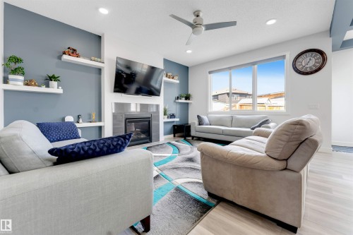2912 12 Avenue Nw, Edmonton, AB - Indoor Photo Showing Living Room With Fireplace