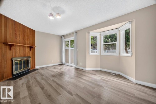 #23 10453 20 Av Nw, Edmonton, AB - Indoor With Fireplace