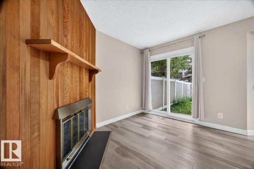 #23 10453 20 Av Nw, Edmonton, AB - Indoor With Fireplace