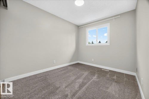 #23 10453 20 Av Nw, Edmonton, AB - Indoor Photo Showing Other Room