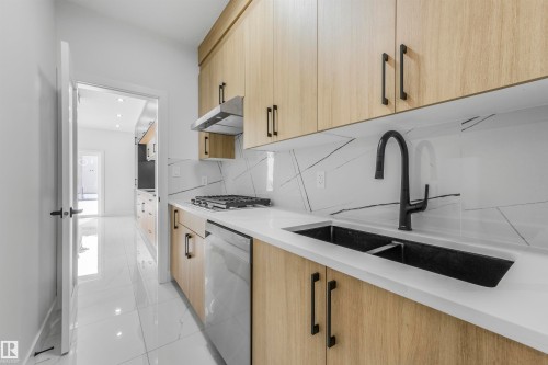 3507 44 Avenue, Beaumont, AB - Indoor Photo Showing Kitchen With Double Sink