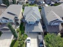 Aerial perspective showcasing a two-story residence with a multi-gabled roofline - 8719 218 Street Nw, Edmonton, AB  - Outdoor 