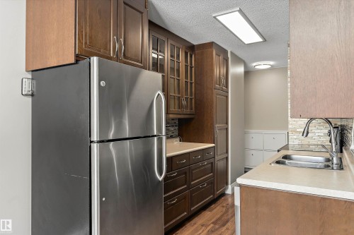 #1002 9725 106 St Nw, Edmonton, AB - Indoor Photo Showing Kitchen With Double Sink