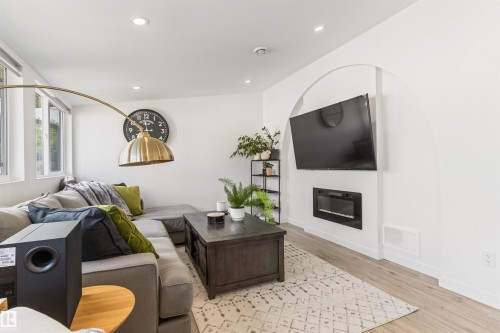 9342 74 Avenue Nw, Edmonton, AB - Indoor Photo Showing Living Room With Fireplace