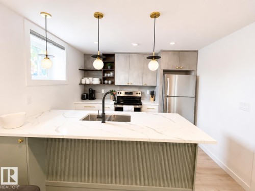 9342 74 Avenue Nw, Edmonton, AB - Indoor Photo Showing Kitchen With Stainless Steel Kitchen With Upgraded Kitchen