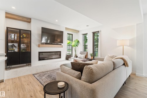9342 74 Avenue Nw, Edmonton, AB - Indoor Photo Showing Living Room With Fireplace