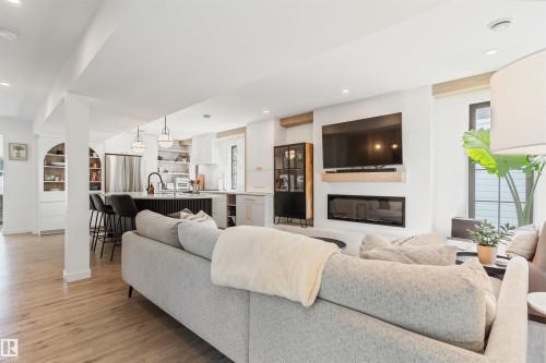 9342 74 Avenue Nw, Edmonton, AB - Indoor Photo Showing Living Room With Fireplace