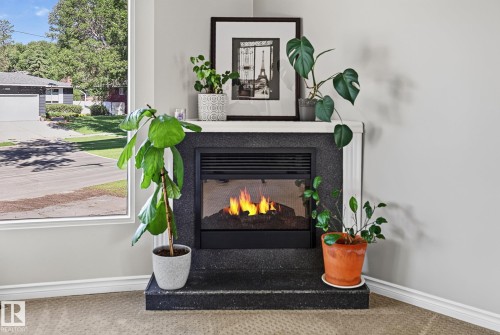 7707 156 Street Nw, Edmonton, AB - Indoor With Fireplace