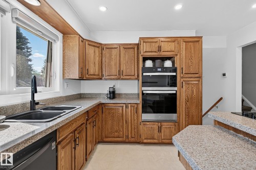 7707 156 Street Nw, Edmonton, AB - Indoor Photo Showing Kitchen With Double Sink