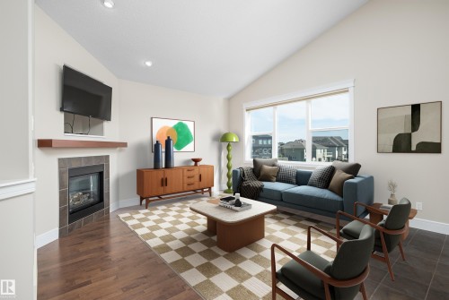 65 Lakewood Boulevard, Beaumont, AB - Indoor Photo Showing Living Room With Fireplace