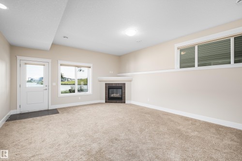 65 Lakewood Boulevard, Beaumont, AB - Indoor With Fireplace