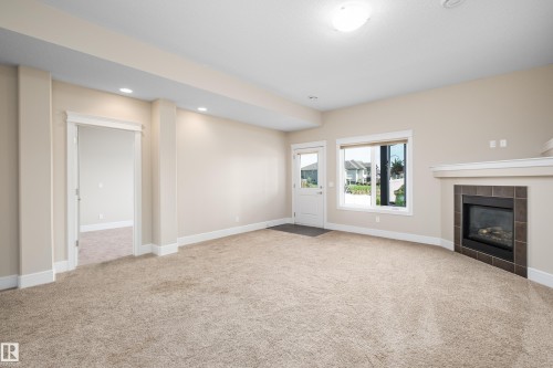 65 Lakewood Boulevard, Beaumont, AB - Indoor With Fireplace