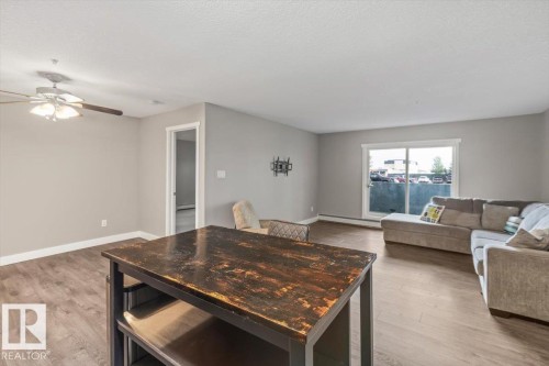 #116 9910 107 St, Morinville, AB - Indoor Photo Showing Living Room