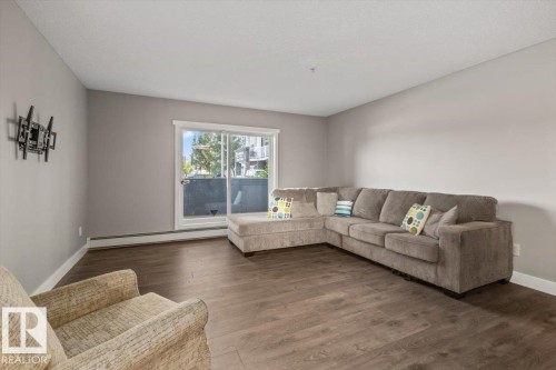 #116 9910 107 St, Morinville, AB - Indoor Photo Showing Living Room