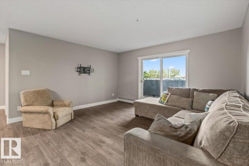 #116 9910 107 St, Morinville, AB - Indoor Photo Showing Living Room