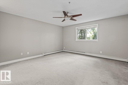 #116 9910 107 St, Morinville, AB - Indoor Photo Showing Other Room